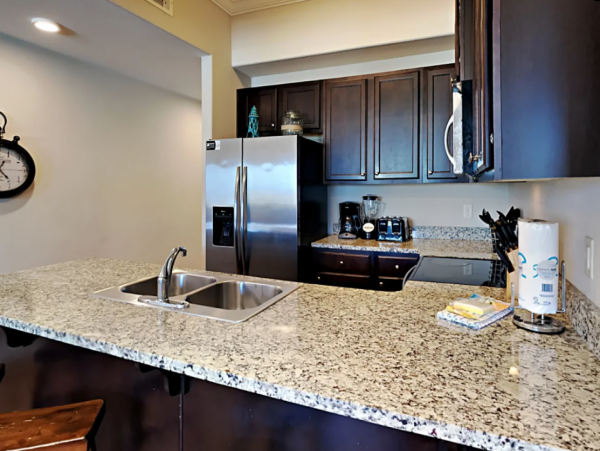 Two Bedroom Vacation Condo Sleeps 6 Short Walk to Beach