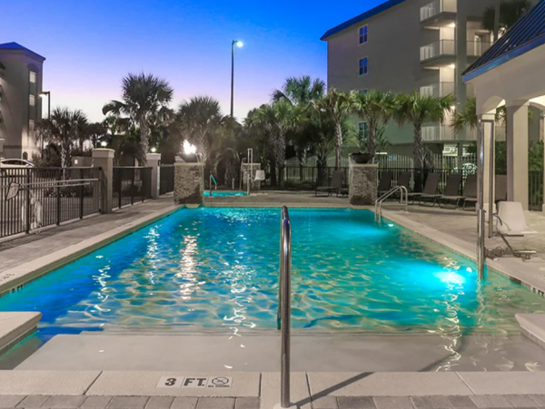 Two Bedroom Vacation Condo Sleeps 6 Short Walk to Beach