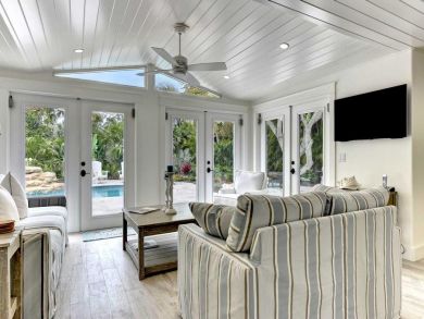 Living Area with Doors to Pool