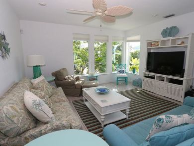 Spacious Living Area with Large Flat Screen TV
