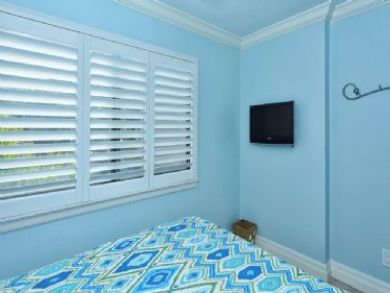 Wall Mounted TV in Double Bedroom
