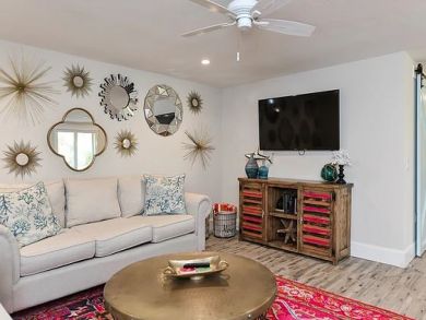 Sofa and Wall Mounted TV