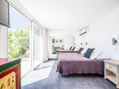 Bedroom with Doors to Outside