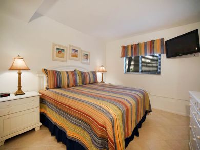 Bedroom with Wall Mounted TV