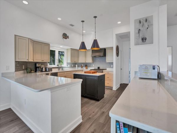 Boca Grande Luxury 4-Bedroom Bayfront Home with Dock and Short Walk to Sandy Beach Huge Pool!