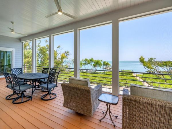 Boca Grande Luxury 4-Bedroom Bayfront Home with Dock and Short Walk to Sandy Beach Huge Pool!