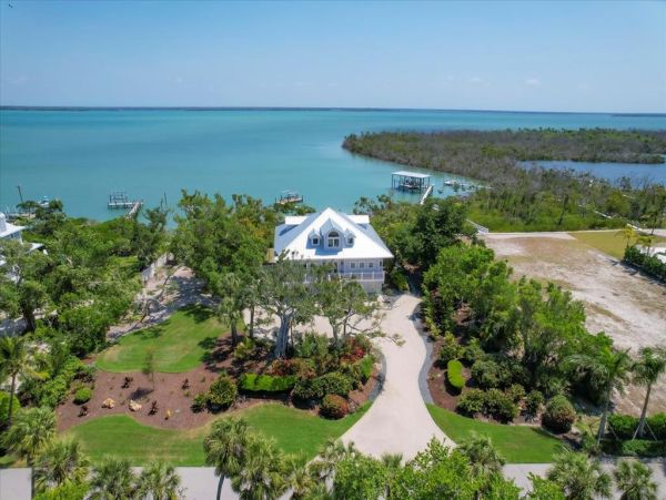 Boca Grande Luxury 4-Bedroom Bayfront Home with Dock and Short Walk to Sandy Beach Huge Pool!