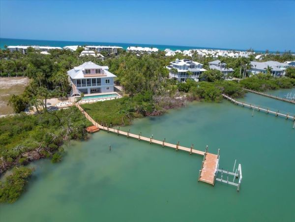 Boca Grande Luxury 4-Bedroom Bayfront Home with Dock and Short Walk to Sandy Beach Huge Pool!