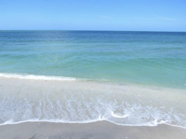 Boca Grande Luxury 4-Bedroom Bayfront Home with Dock and Short Walk to Sandy Beach Huge Pool!
