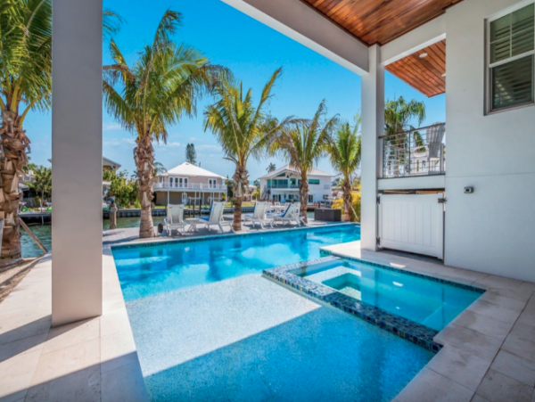 One of the Most Stunning Rentals on Anna Maria Island 5 Star with Canal and Boat Dock