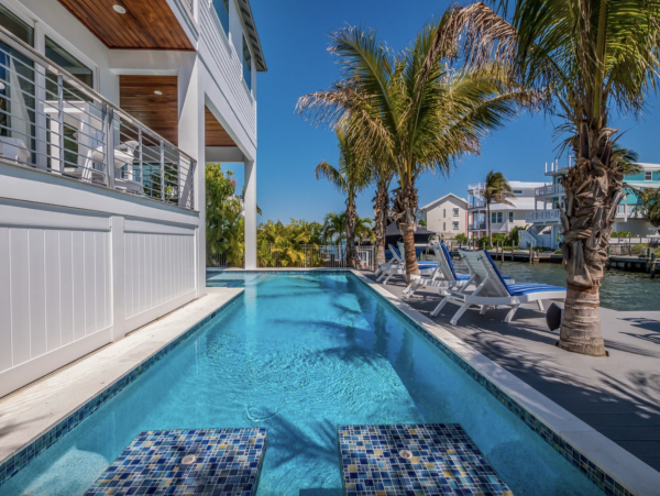 One of the Most Stunning Rentals on Anna Maria Island 5 Star with Canal and Boat Dock