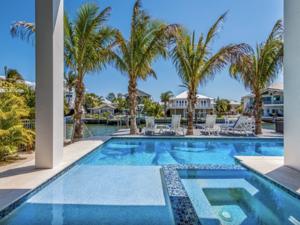 One of the Most Stunning Rentals on Anna Maria Island 5 Star with Canal and Boat Dock