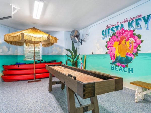Short Walk to Beach from this Four Bedroom Condo in Siesta Key