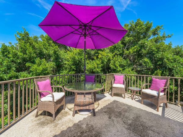 Short Walk to Beach from this Four Bedroom Condo in Siesta Key