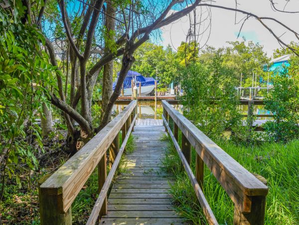 Short Walk to Beach from this Four Bedroom Condo in Siesta Key