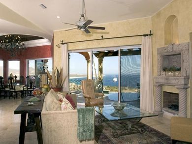 living room with fireplace and view