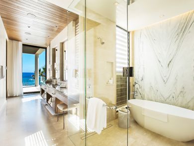 bathroom with tub and shower