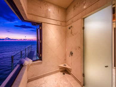 Wake in your Canopy Bed Looking Out Onto the Ocean.