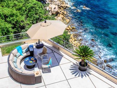Wake in your Canopy Bed Looking Out Onto the Ocean.