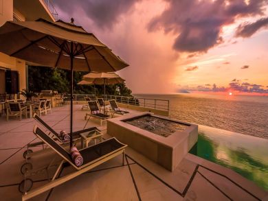 Wake in your Canopy Bed Looking Out Onto the Ocean.