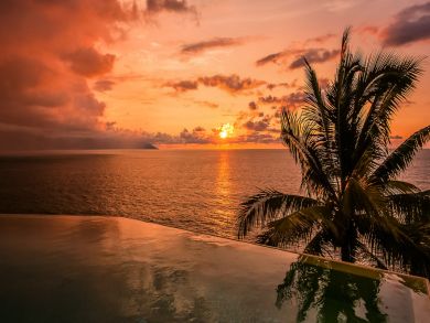 Wake in your Canopy Bed Looking Out Onto the Ocean.