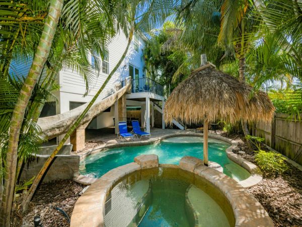 Luxury Holmes Beach Vacation Rental 6-Bedroom Anna Maria Island Home with Pool & Waterslide