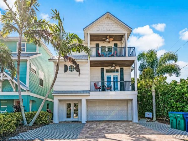 Luxury Holmes Beach Vacation Rental 6-Bedroom Anna Maria Island Home with Pool & Waterslide