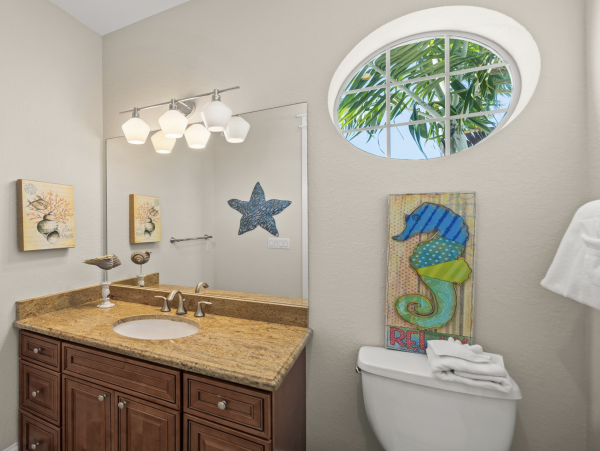 Luxury Holmes Beach Vacation Rental 6-Bedroom Anna Maria Island Home with Pool & Waterslide