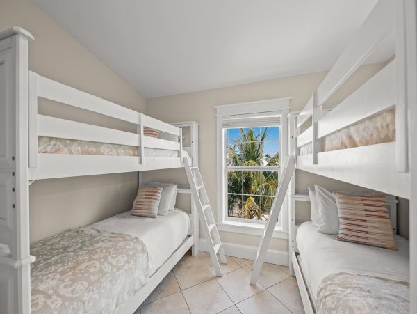 Luxury Holmes Beach Vacation Rental 6-Bedroom Anna Maria Island Home with Pool & Waterslide
