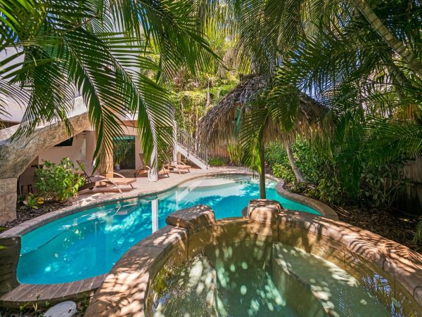 Luxury Holmes Beach Vacation Rental 6-Bedroom Anna Maria Island Home with Pool & Waterslide