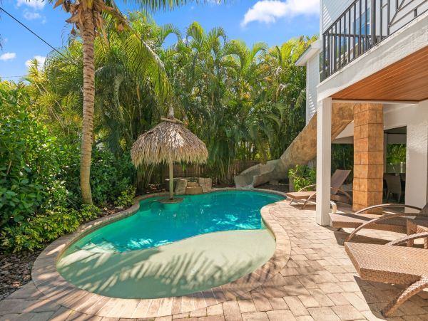 Luxury Holmes Beach Vacation Rental 6-Bedroom Anna Maria Island Home with Pool & Waterslide