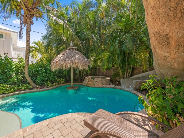Luxury Holmes Beach Vacation Rental 6-Bedroom Anna Maria Island Home with Pool & Waterslide