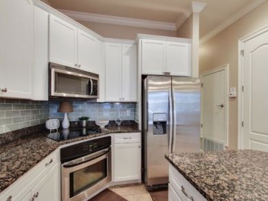 This kitchen has everything you need to make meals on your vacation. This kitchen has everything you need to make meals on your vacation.