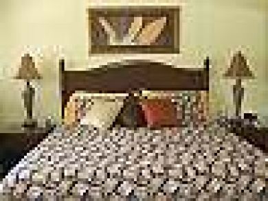 Master bedroom with king bed Master bedroom with king bed