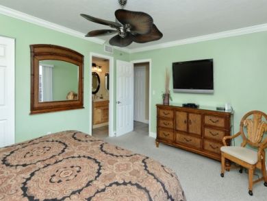 Bedroom with Wall Mounted TV