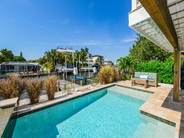 Holmes Beach Canal Front Home with Dock - Direct Bay Access