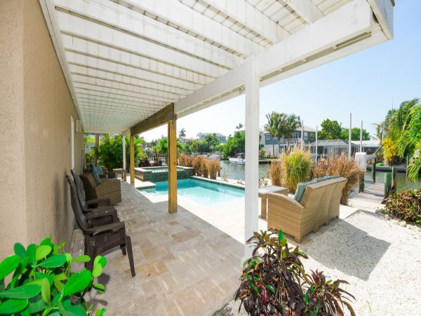 Holmes Beach Canal Front Home with Dock - Direct Bay Access
