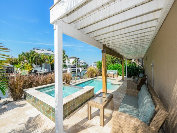Holmes Beach Canal Front Home with Dock - Direct Bay Access