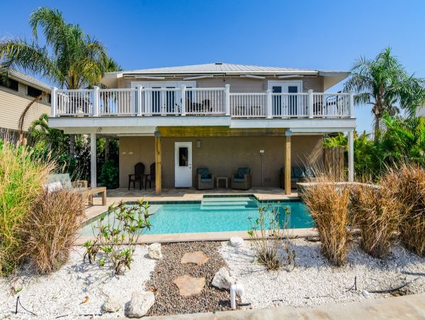 Holmes Beach Canal Front Home with Dock - Direct Bay Access