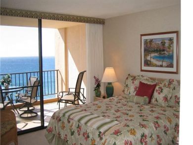 Bedroom with king bed & balcony
