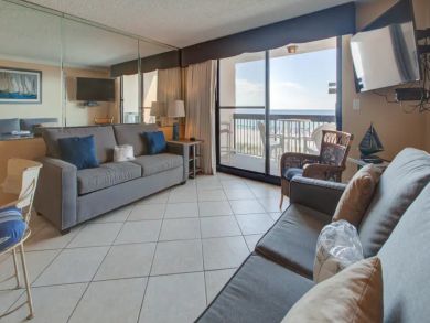 Beachfront One Bedroom Condo with Sweeping Views