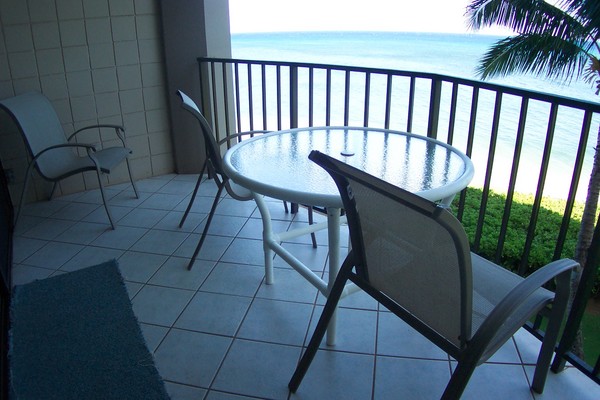 Balcony with table set & ocean view