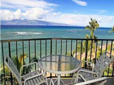 Ocean view balcony with table set