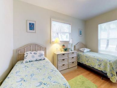Holmes Beach Duplex with Separate Pools Sleeps 10
