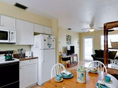 Holmes Beach Duplex with Separate Pools Sleeps 10
