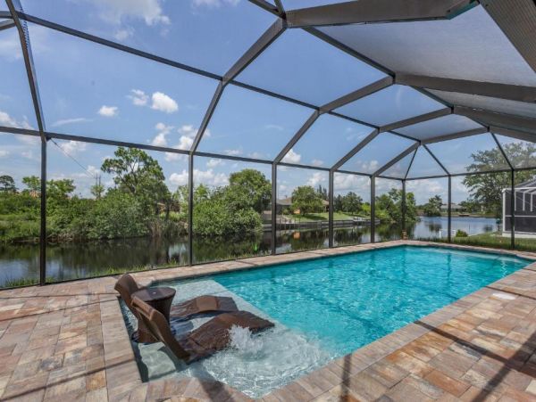 Cape Coral 4 Bedroom Home with Canal View & Dock