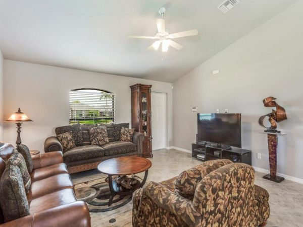 Cape Coral 4 Bedroom Home with Canal View & Dock