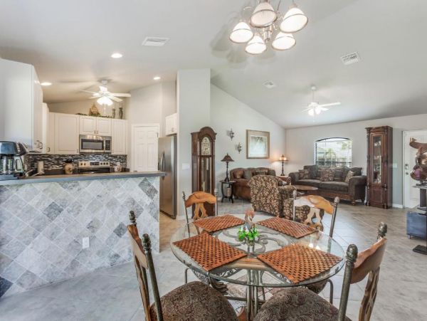 Cape Coral 4 Bedroom Home with Canal View & Dock