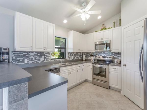 Cape Coral 4 Bedroom Home with Canal View & Dock