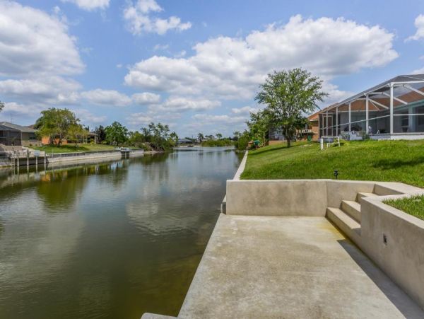 Cape Coral 4 Bedroom Home with Canal View & Dock